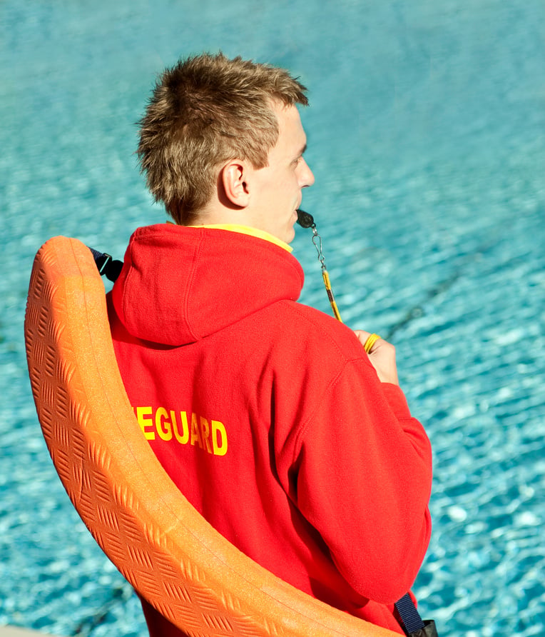 Life Guard Watching Swimming Pool